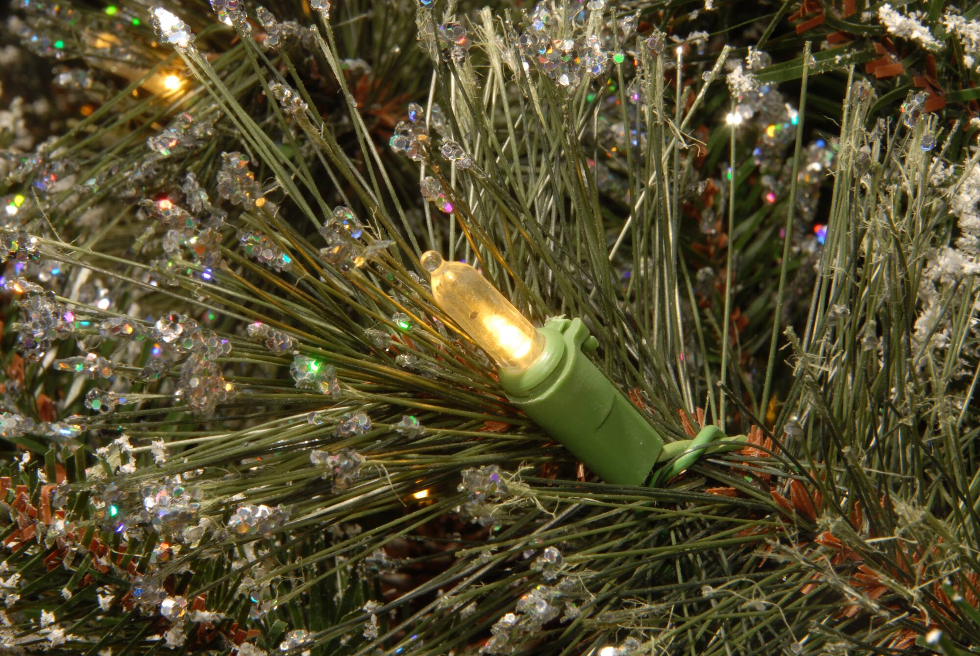 9' x 10" Pre-lit Glittery Bristle® Pine Artificial Christmas Garland with White Tipped Cones and 50 Clear Lights